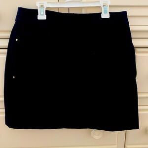 NICE black skirt by H & M. Marked Size 10.  15” waist.